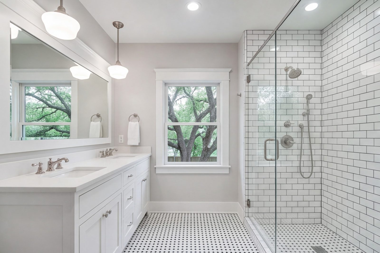 Arlington Heights bathroom with a walk-in shower, wide vanity and tile to the ceiling